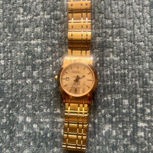 Gold women’s   Burberry Watch